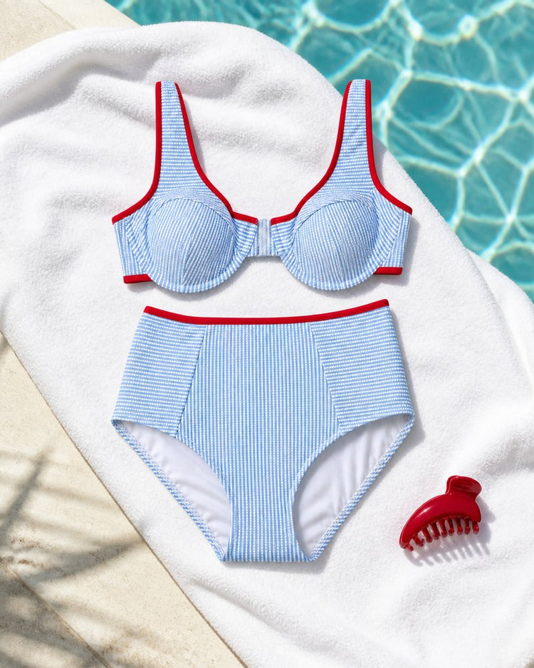 Coast Tempo Poolline Bikini Set arranged poolside beside clear blue water