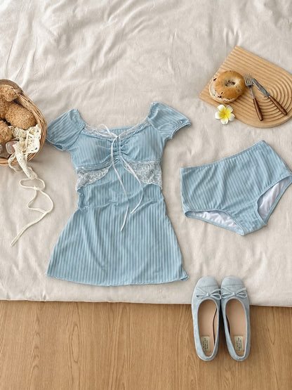 Coast Tempo Bluebell Lace Swim Dress Set in powder blue and cream, flat lay view