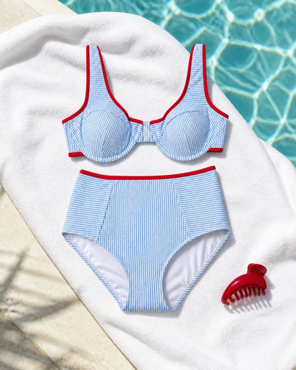 Coast Tempo Poolline Bikini Set arranged poolside beside clear blue water